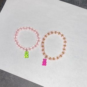 Pink beads bracelets with gold and without .